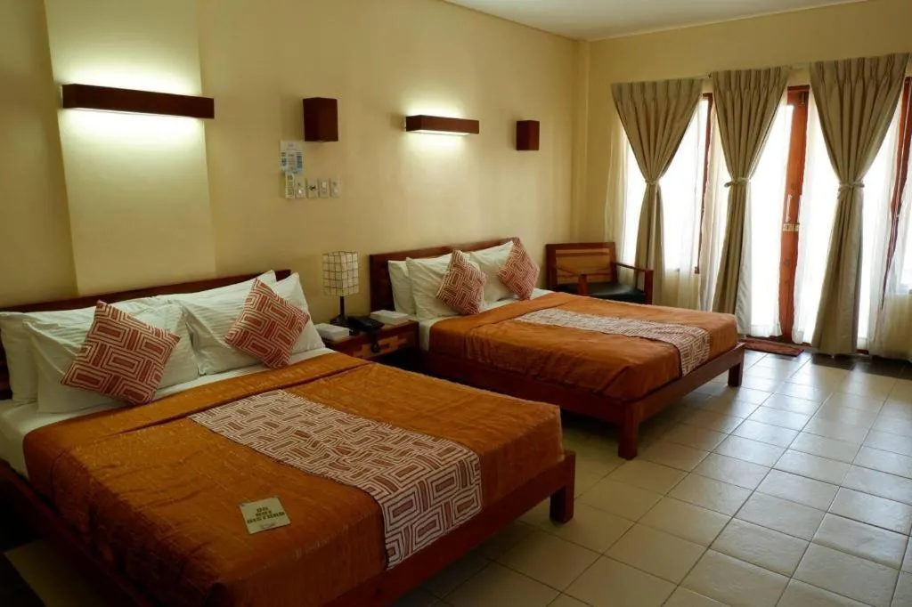 Bed in Kahuna Beach Resort and Spa