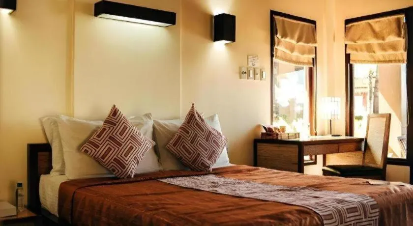 Bed in Kahuna Beach Resort and Spa