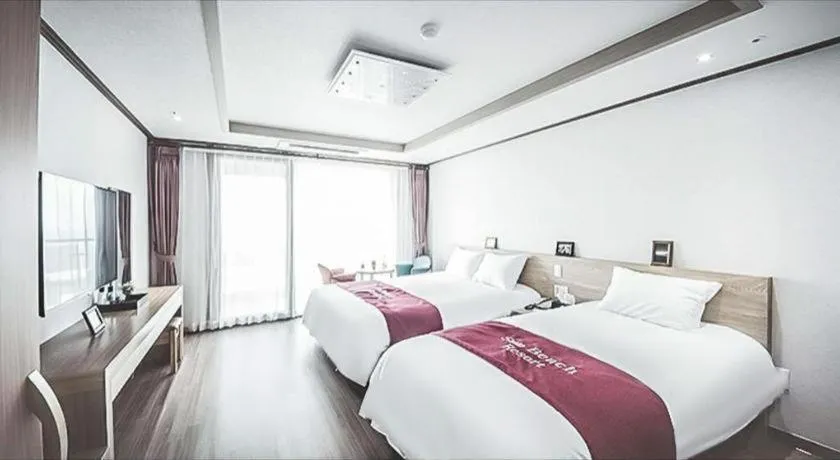 Bed in Jeju Sunbeach Hotel & Resort