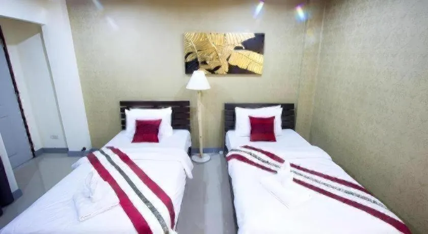 Bed in Sripoom Boutique House