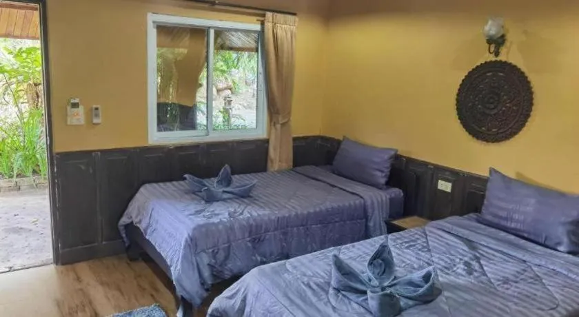 Bed in Wangnamkhao Resort