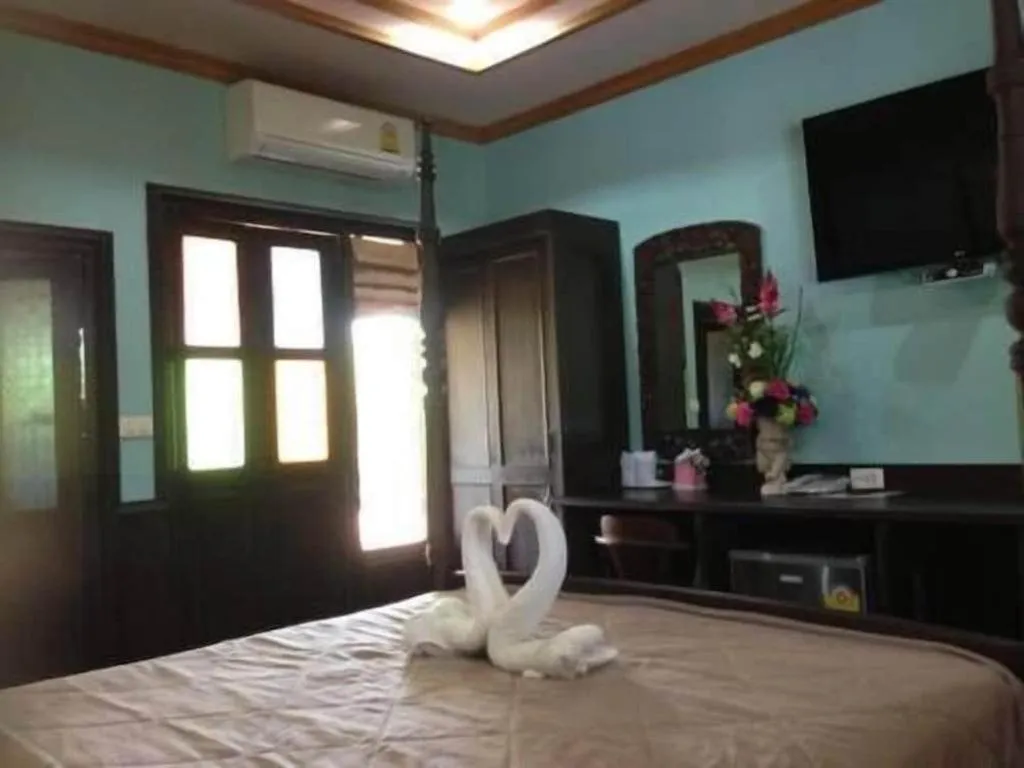 Bed in Wangnamkhao Resort