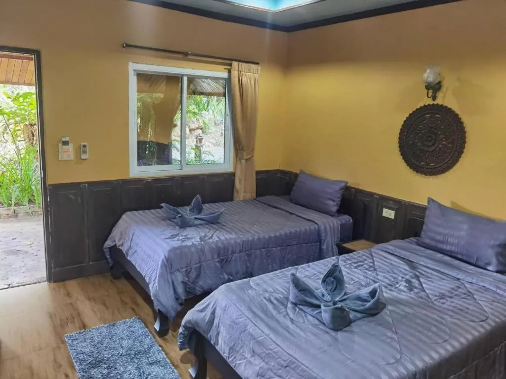 Bed in Wangnamkhao Resort