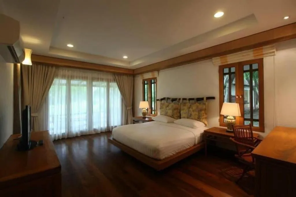 Bed in Chiangkham Luang Resort