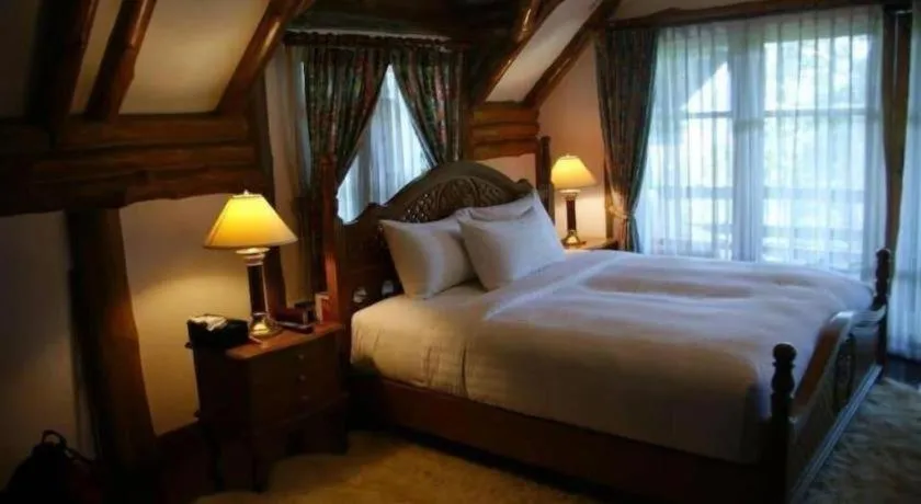 Bed in Chiangkham Luang Resort