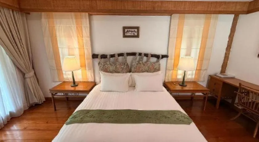 Bed in Chiangkham Luang Resort