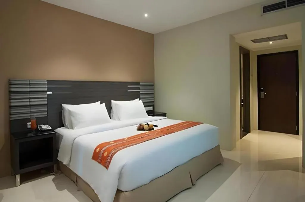Bed in Aria Barito Hotel
