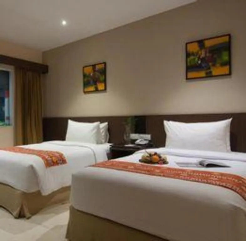 Bed in Aria Barito Hotel