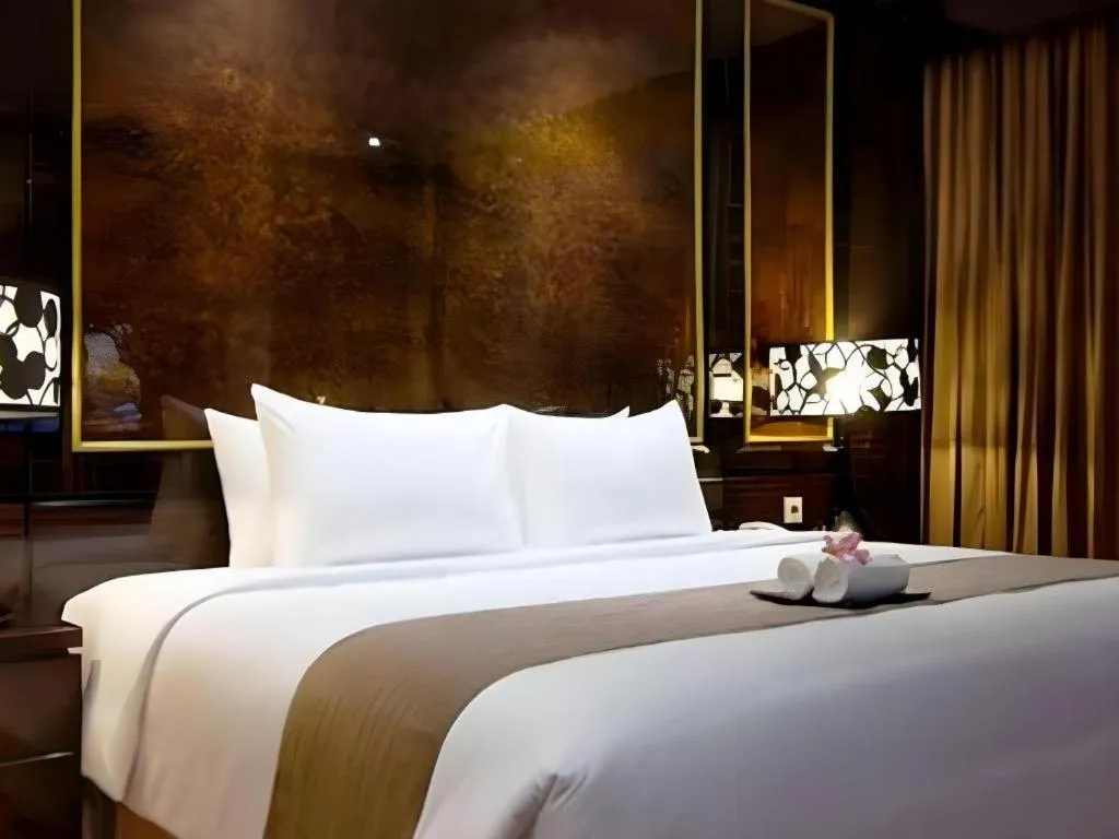 Bed in Aria Barito Hotel