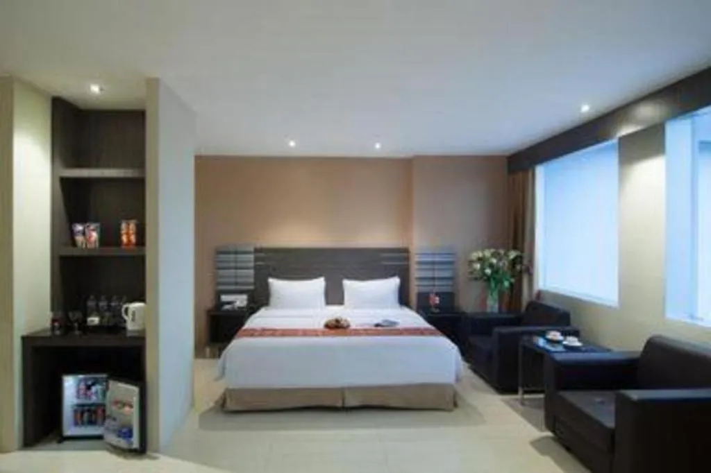 Bed in Aria Barito Hotel