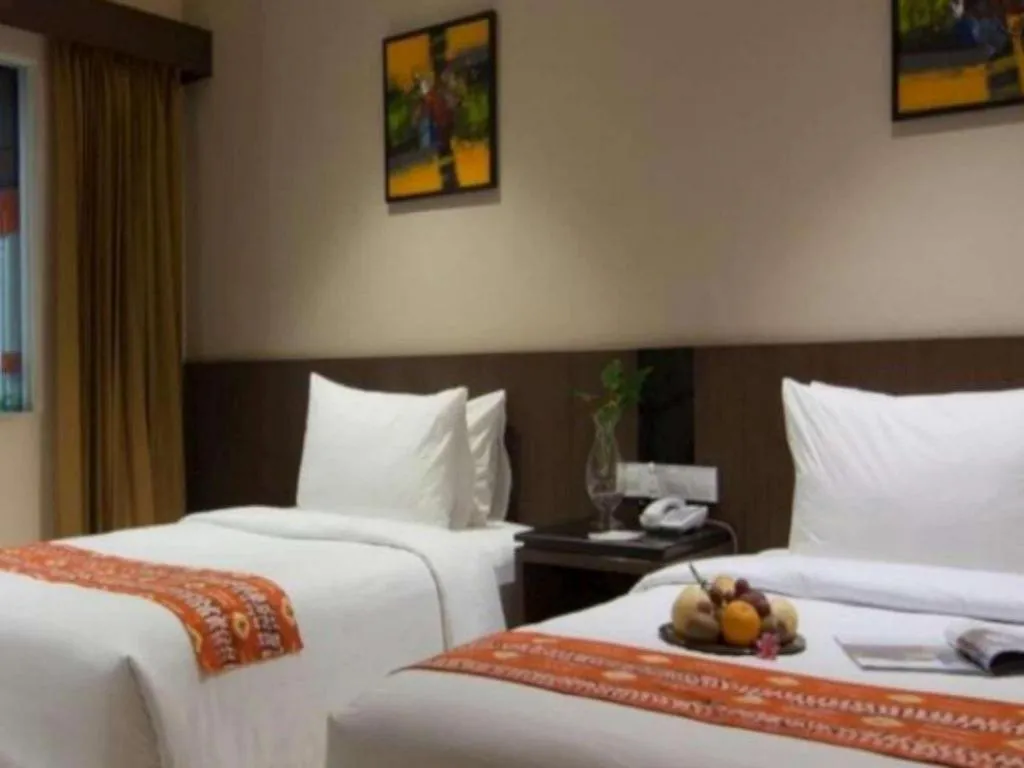 Bed in Aria Barito Hotel