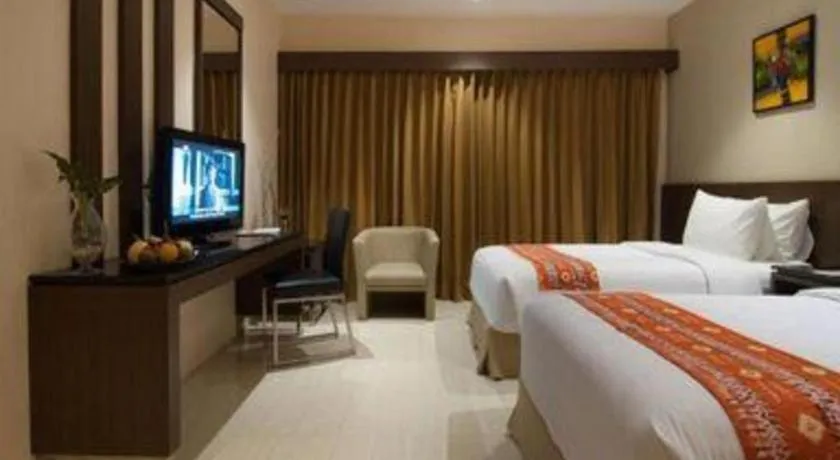 Bed in Aria Barito Hotel