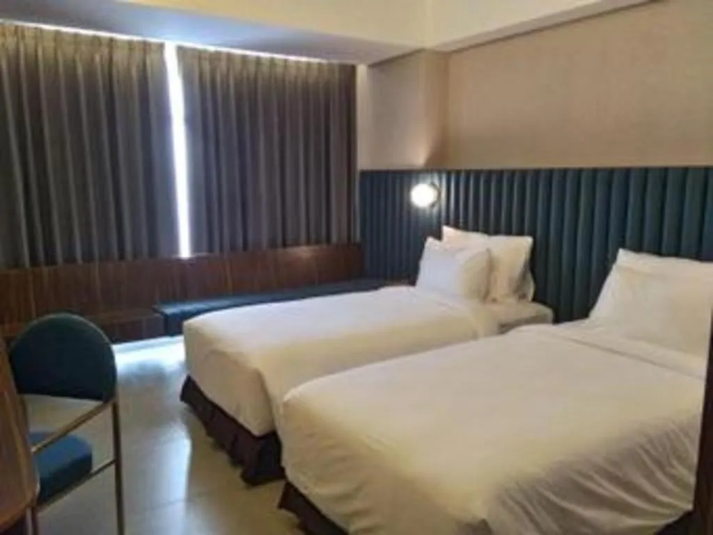 Bed in The Bono Hotel Pekanbaru