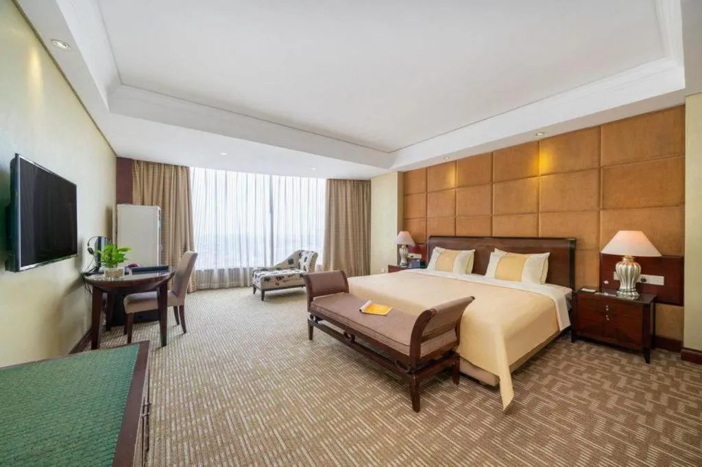 Bed in Chinflux Mandarin Hotel