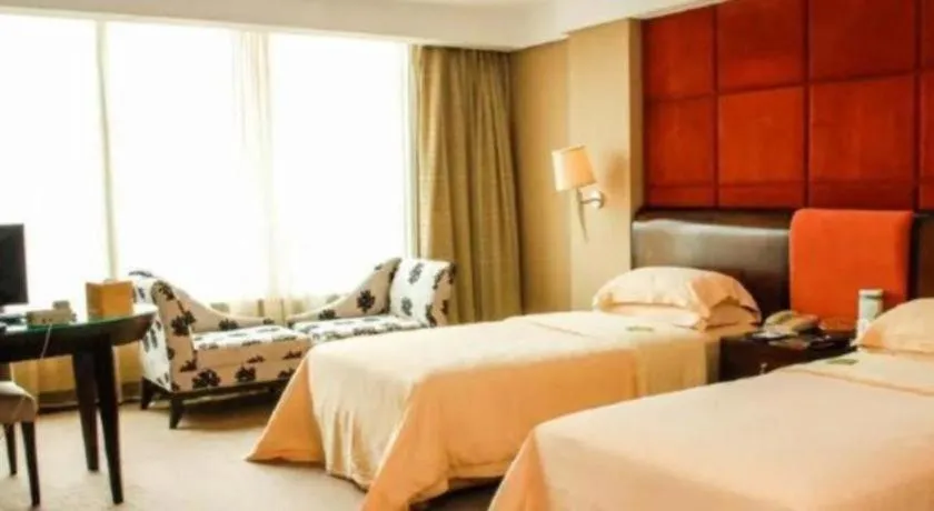 Bed in Chinflux Mandarin Hotel