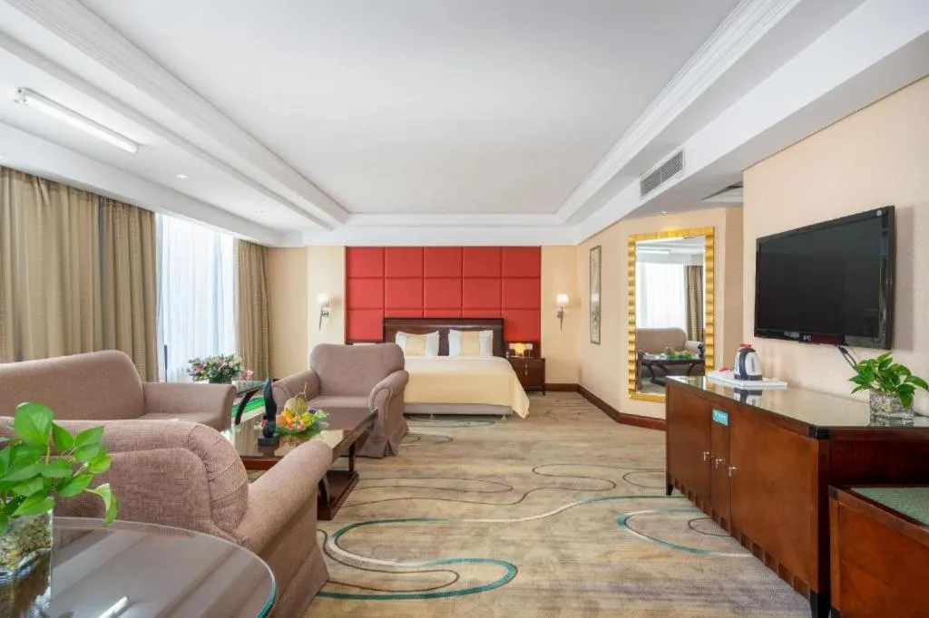 Bed in Chinflux Mandarin Hotel