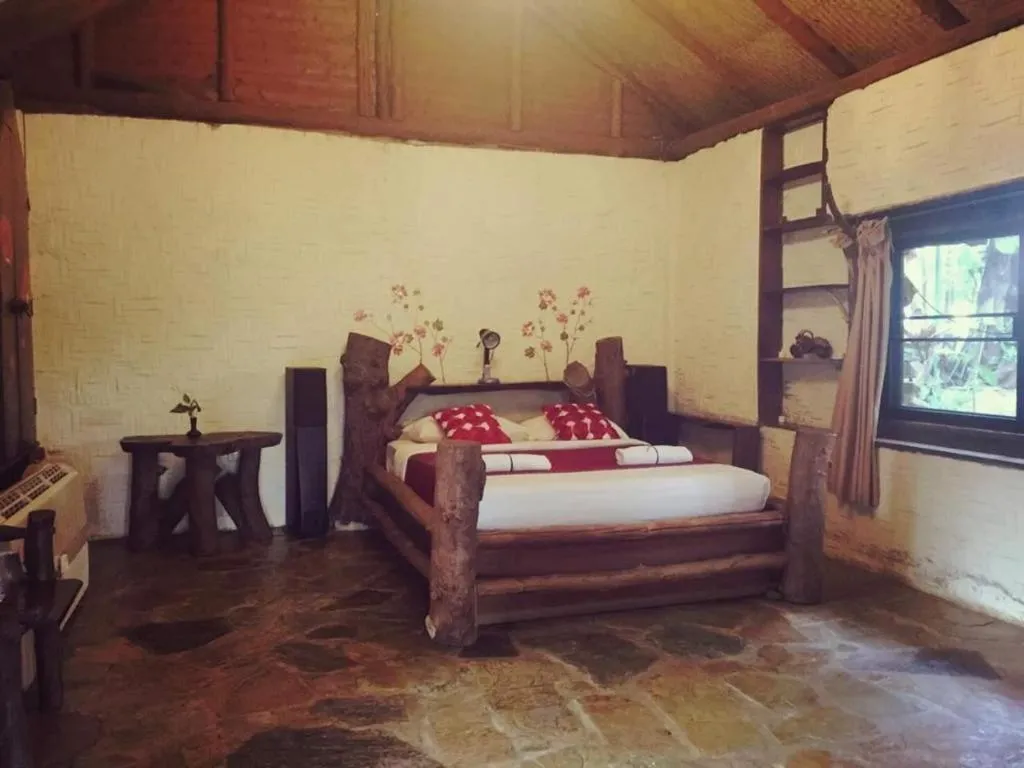 Bed in Tayan Resort Kanchanaburi