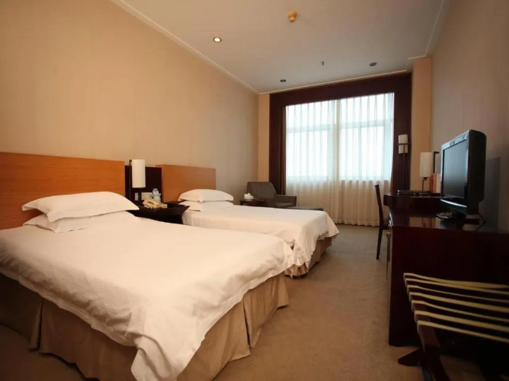 Bed in Rezen Hotel Huaxia Xiamen
