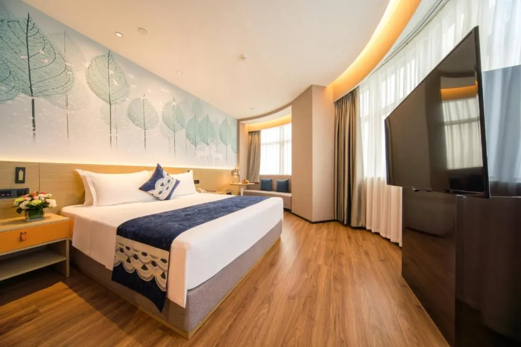 Bed in Rezen Hotel Huaxia Xiamen