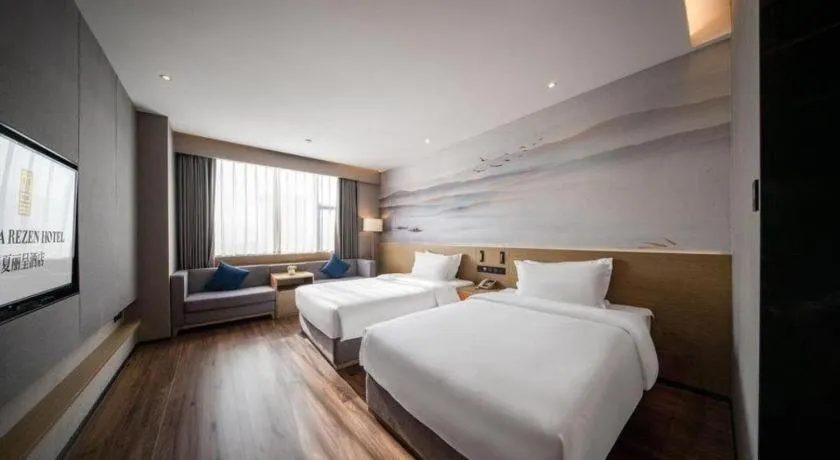 Bed in Rezen Hotel Huaxia Xiamen