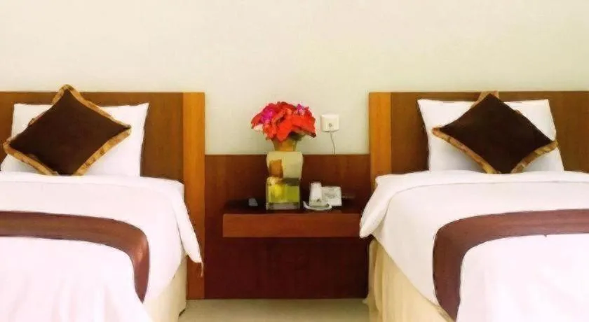 Bed in Mataram Square Hotel