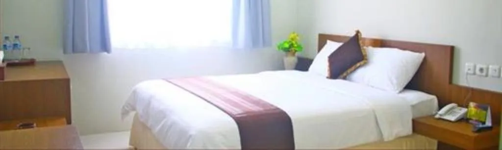 Bed in Mataram Square Hotel