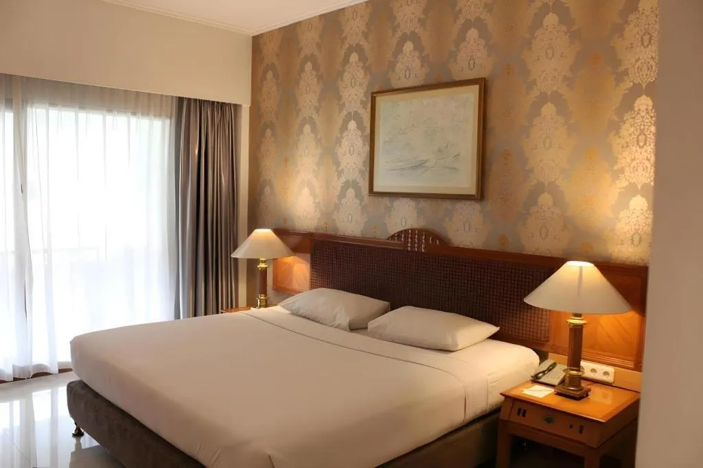 Bed in Bumi Wiyata Hotel