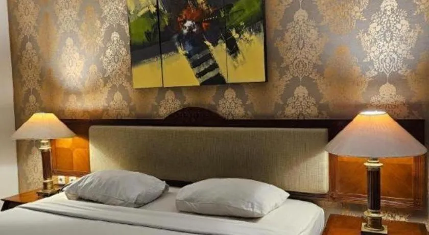 Bed in Bumi Wiyata Hotel