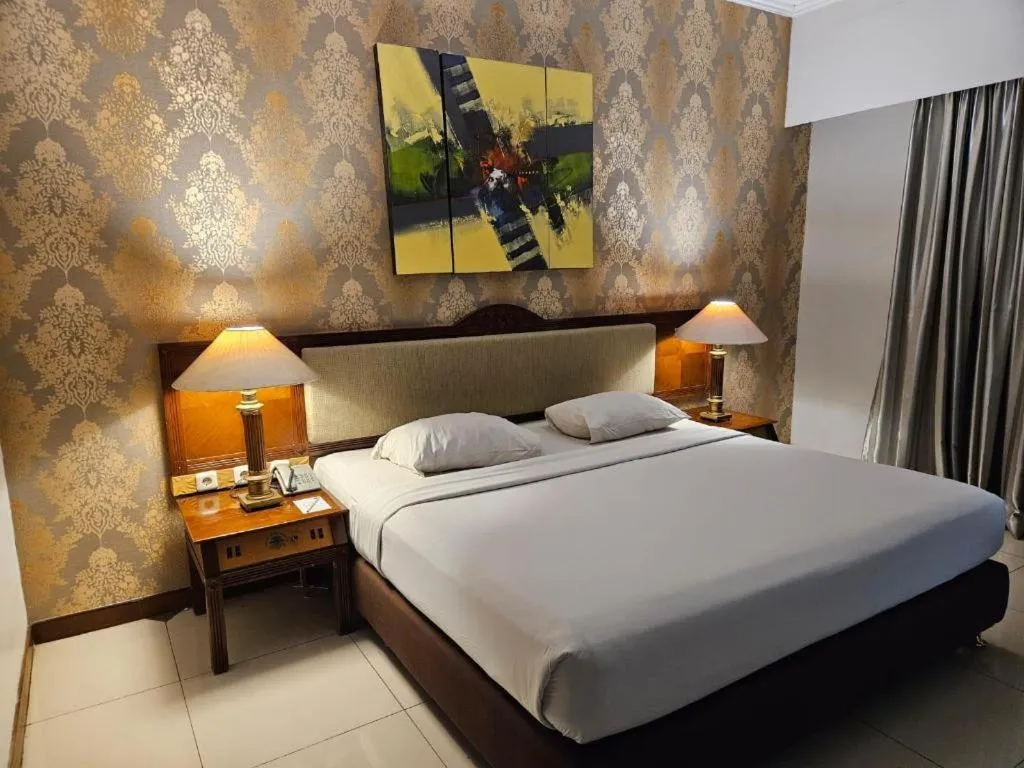 Bed in Bumi Wiyata Hotel