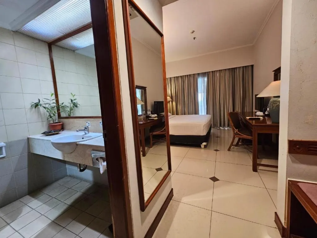 Bed in Bumi Wiyata Hotel