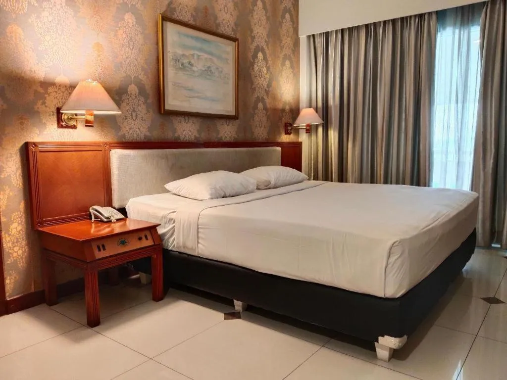 Bed in Bumi Wiyata Hotel