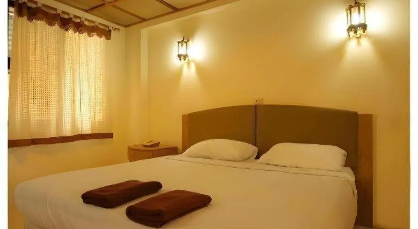 Bed in Panorama Hotel