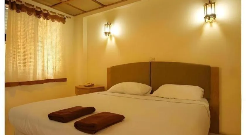 Bed in Panorama Hotel