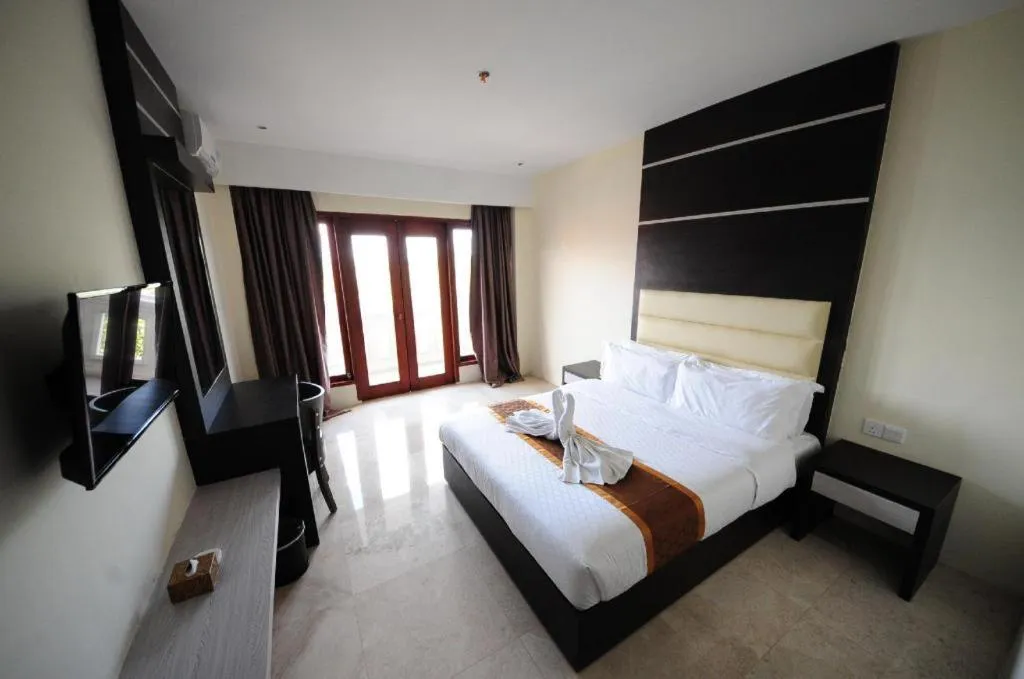 Bed in Nipah Island Resort