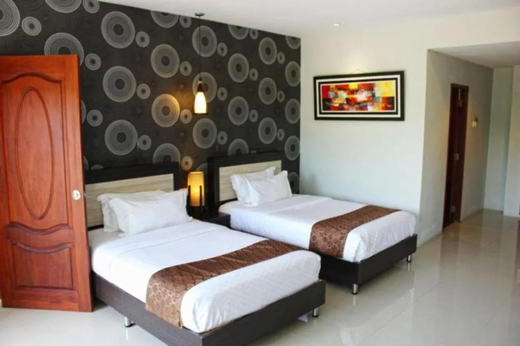 Bed in Nipah Island Resort