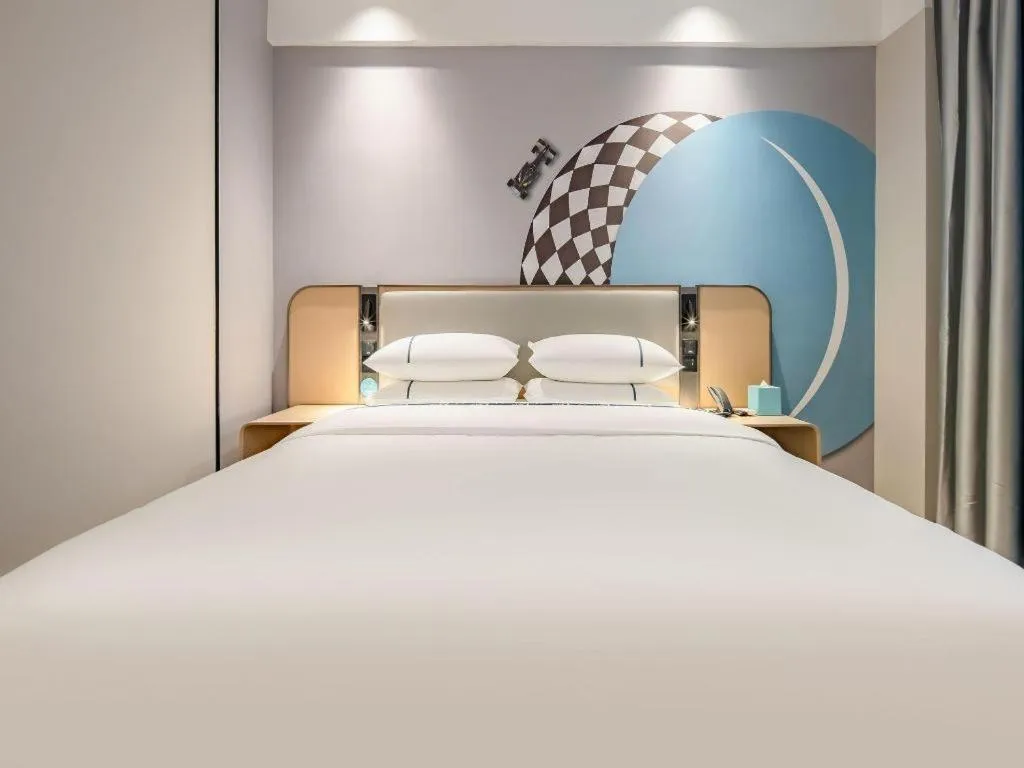 Bed in City Comfort Inn Dongxing National Trade Port