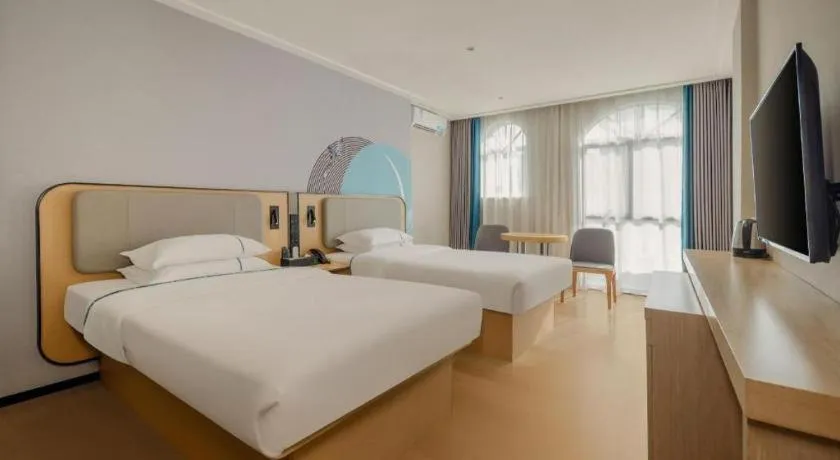 Bed in City Comfort Inn Dongxing National Trade Port