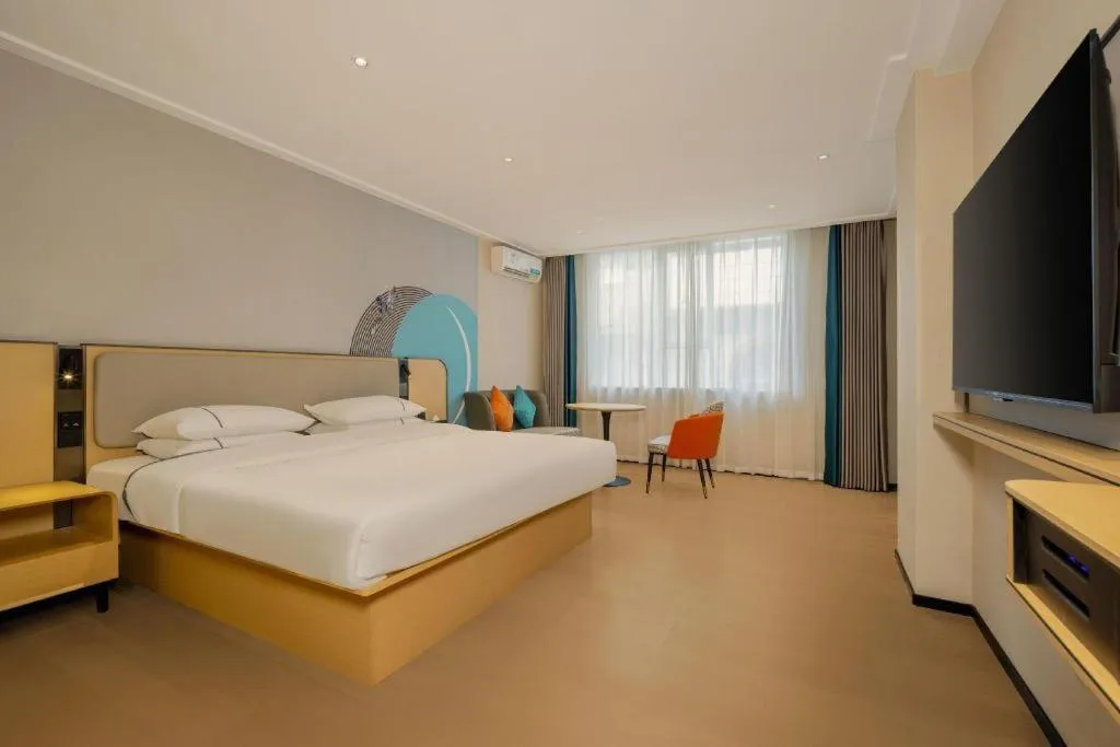 Bed in City Comfort Inn Dongxing National Trade Port