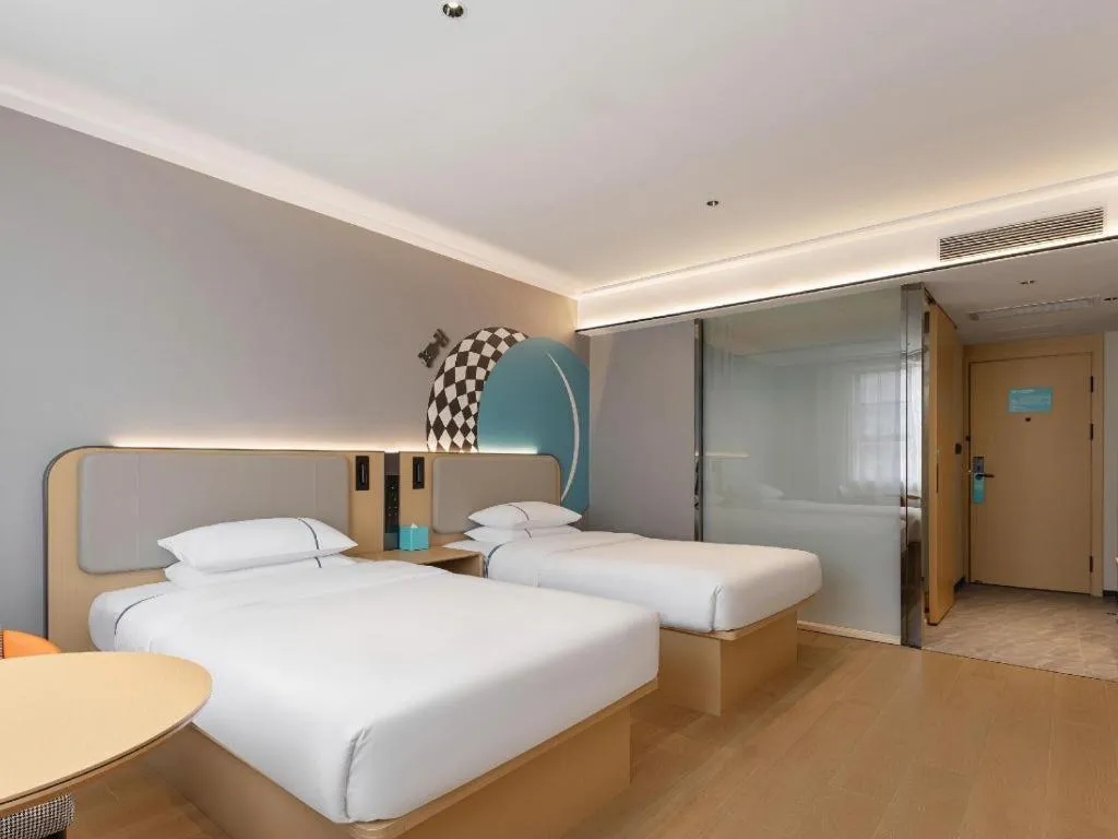 Bed in City Comfort Inn Dongxing National Trade Port