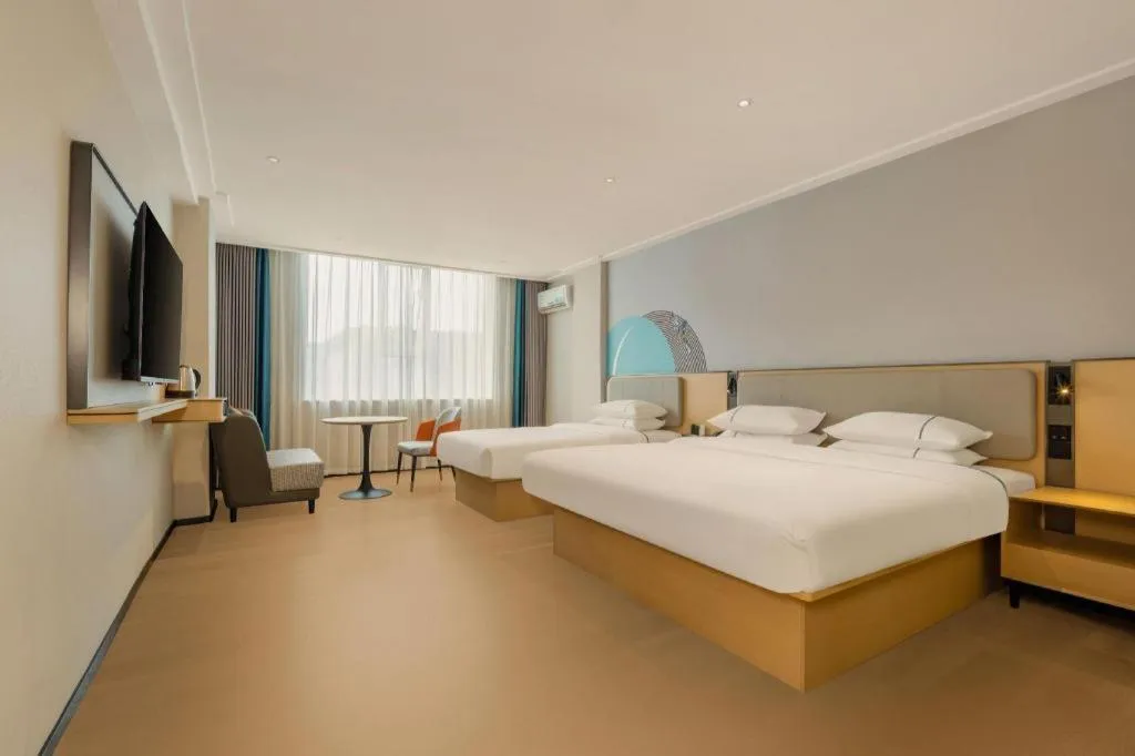 Bed in City Comfort Inn Dongxing National Trade Port