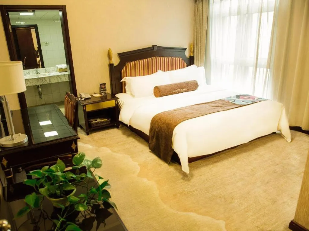 Bed in James Joyce Coffetel Qinhuangdao Taiyangcheng Wenhua Road