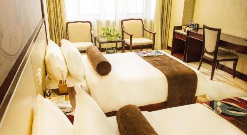 Bed in James Joyce Coffetel Qinhuangdao Taiyangcheng Wenhua Road