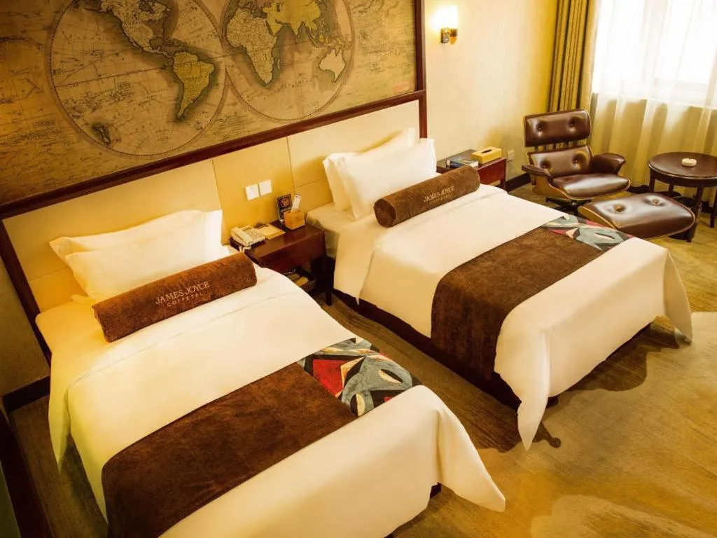 Bed in James Joyce Coffetel Qinhuangdao Taiyangcheng Wenhua Road