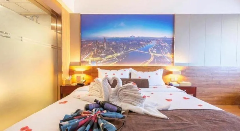 Bed in James Joyce Coffetel Qinhuangdao Taiyangcheng Wenhua Road