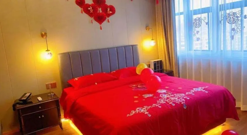 Bed in James Joyce Coffetel Qinhuangdao Taiyangcheng Wenhua Road