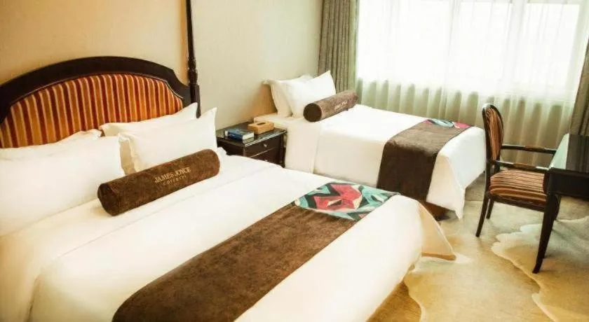 Bed in James Joyce Coffetel Qinhuangdao Taiyangcheng Wenhua Road