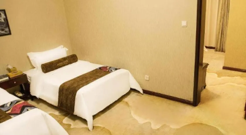 Bed in James Joyce Coffetel Qinhuangdao Taiyangcheng Wenhua Road