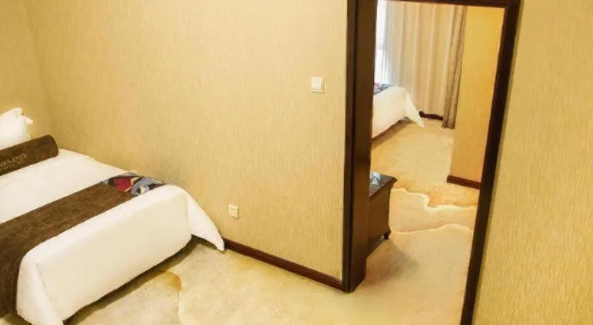 Bed in James Joyce Coffetel Qinhuangdao Taiyangcheng Wenhua Road