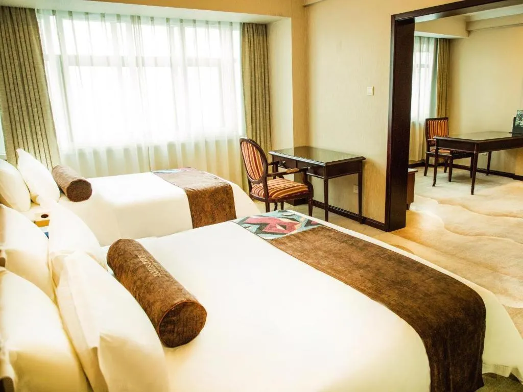 Bed in James Joyce Coffetel Qinhuangdao Taiyangcheng Wenhua Road