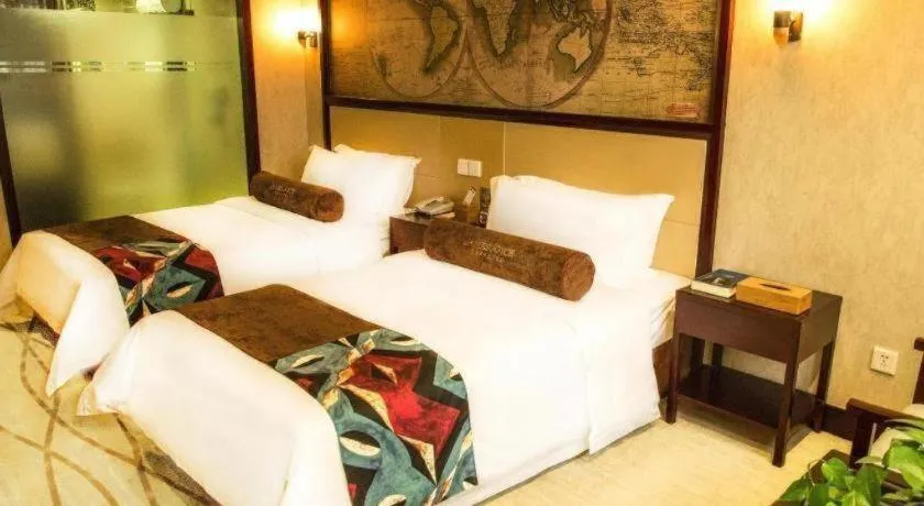 Bed in James Joyce Coffetel Qinhuangdao Taiyangcheng Wenhua Road